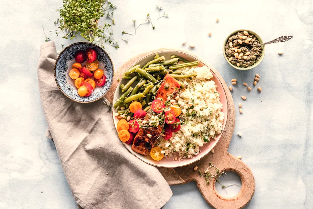 Salmon with green beans and couscous, plated at home